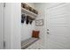 Inviting mudroom with seating, storage, and decor at 6500 Bass Mountain Rd, Snow Camp, NC 27349