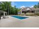 Enjoy the outdoors with a sparkling pool, lounge chairs, and lush green landscaping at 6500 Bass Mountain Rd, Snow Camp, NC 27349