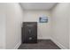 Secure room featuring a Winchester safe, tiled floor, and mounted television at 6500 Bass Mountain Rd, Snow Camp, NC 27349
