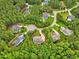 Stunning aerial view of homes nestled amongst the trees in the Chapel Ridge community at 67 Spring Hollow Ct, Pittsboro, NC 27312