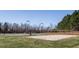 Community basketball court and sand volleyball, offering residents diverse recreational opportunities at 67 Spring Hollow Ct, Pittsboro, NC 27312