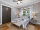 Comfortable bedroom featuring a cozy bed, natural light, and stylish decor at 67 Spring Hollow Ct, Pittsboro, NC 27312