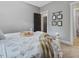 Bedroom featuring neutral paint color, carpet and a view of secondary bedrooms through open doors at 67 Spring Hollow Ct, Pittsboro, NC 27312