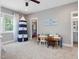bedroom featuring ample floor space and play area with a view to an en suite bathroom at 67 Spring Hollow Ct, Pittsboro, NC 27312