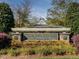 Entrance sign to Chapel Ridge Property Owners Club surrounded by lush greenery at 67 Spring Hollow Ct, Pittsboro, NC 27312