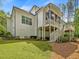 Charming home with screened porch, back deck, manicured lawn, and mature landscaping at 67 Spring Hollow Ct, Pittsboro, NC 27312