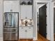 Contemporary kitchen with stainless steel appliances, custom cabinets, and a convenient coffee bar at 67 Spring Hollow Ct, Pittsboro, NC 27312