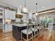 Bright, open kitchen with a large island perfect for dining, and modern appliances at 67 Spring Hollow Ct, Pittsboro, NC 27312