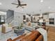 Spacious living room seamlessly connects to the kitchen area, creating an open and inviting living space at 67 Spring Hollow Ct, Pittsboro, NC 27312