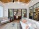 Inviting sunroom with comfortable seating, views to interior, perfect for relaxation and entertaining at 67 Spring Hollow Ct, Pittsboro, NC 27312