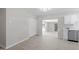 Dining room with new vinyl flooring, white walls and closet at 7216 Carlton Dr, Raleigh, NC 27616