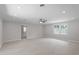 Spacious living room with modern vinyl floors, ample natural light, and neutral paint at 7216 Carlton Dr, Raleigh, NC 27616