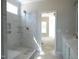 Bathroom features a tiled shower, marble countertops, and double vanity at 788 Shade Tree Rd, Benson, NC 27504