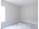 Unfinished room with bare concrete, a window and electrical sockets at 788 Shade Tree Rd, Benson, NC 27504