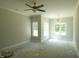 Bedroom featuring a ceiling fan and multiple windows for ample natural light at 788 Shade Tree Rd, Benson, NC 27504