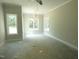 Bright bedroom with large windows, neutral paint, and ample natural light at 788 Shade Tree Rd, Benson, NC 27504