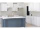 Bright kitchen with island and marble countertops, offers space and modern style at 788 Shade Tree Rd, Benson, NC 27504