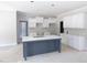 Bright kitchen with island and marble countertops, offers space and modern style at 788 Shade Tree Rd, Benson, NC 27504