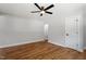 Cozy bedroom features hardwood floors, ceiling fan and plenty of closet space at 833 Brigham Rd, Raleigh, NC 27610