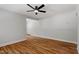 Spacious living room with hardwood floors, neutral walls and ample natural light at 833 Brigham Rd, Raleigh, NC 27610