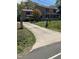 Charming two-story home with a long driveway and manicured lawn at 836 S Main St, Roxboro, NC 27573