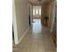 A home hallway with tiled floor leading to a decorative front door at 836 S Main St, Roxboro, NC 27573