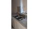 Close up view of a clean, stainless steel, double-basin sink and countertop at 836 S Main St, Roxboro, NC 27573
