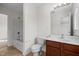 Bathroom featuring a shower-tub combination and a dark wood vanity at 100 Stratford Lakes Dr # 270, Durham, NC 27713