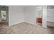 Spacious bedroom with carpet and access to both an ensuite and linen closet at 100 Stratford Lakes Dr # 270, Durham, NC 27713