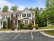 Charming townhome featuring well-maintained landscaping and a dedicated parking area at 100 Stratford Lakes Dr # 270, Durham, NC 27713