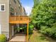 View of the home featuring wood balcony at 100 Stratford Lakes Dr # 270, Durham, NC 27713