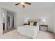 Neutral bedroom with ceiling fan, and ensuite bathroom and walk in closet access at 100 Stratford Lakes Dr # 270, Durham, NC 27713