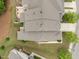 Aerial view of townhome roofs showcasing landscaping, patio, and driveways at 1020 Kingston Grove Dr, Cary, NC 27519