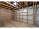 Unfinished attic space showing wooden supports and insulation covered with plastic sheeting at 1020 Kingston Grove Dr, Cary, NC 27519