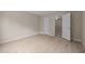Bedroom with modern flooring, neutral walls, and ample natural light at 1020 Kingston Grove Dr, Cary, NC 27519