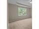 This main bedroom offers trey ceilings, wood-look floors, and plenty of natural light at 1020 Kingston Grove Dr, Cary, NC 27519
