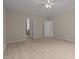 Spacious main bedroom with an en-suite bathroom and wood-look flooring at 1020 Kingston Grove Dr, Cary, NC 27519