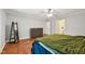 Bright bedroom featuring hardwood floors and neutral walls for a calming atmosphere at 103 Lakeway Ct, Cary, NC 27511