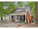 Exterior view of home's convenient carport and outside storage at 103 Lakeway Ct, Cary, NC 27511