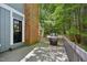 Deck view of grill and brick chimney at 103 Lakeway Ct, Cary, NC 27511