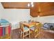 Spacious dining area featuring a large wooden table and vaulted ceilings at 103 Lakeway Ct, Cary, NC 27511