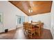Large dining room features wood ceilings and a full-length window at 103 Lakeway Ct, Cary, NC 27511