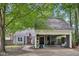 Charming single-story home with a covered carport and an American flag display at 103 Lakeway Ct, Cary, NC 27511