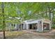 Inviting single-story home showcasing the facade, carport, and landscaping at 103 Lakeway Ct, Cary, NC 27511