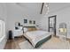 Comfortable bedroom with vaulted ceiling, neutral colors, and natural light at 105 Scotland Dr, Youngsville, NC 27596