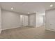 Large bonus room with neutral walls, carpet, recessed lights and multiple entry points at 107 Explorer Dr, Morrisville, NC 27560