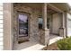 Inviting front porch with brick pillars, house number 107, and a stylish glass-paneled front door at 107 Explorer Dr, Morrisville, NC 27560