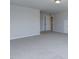 Carpeted bonus room featuring neutral walls, an overhead light, and a doorway at 1087 Fairhaven Dr # 48, Mebane, NC 27302