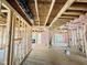 Spacious new construction interior with exposed framing, showing the potential of a modern home at 1087 Fairhaven Dr # 48, Mebane, NC 27302