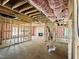 Open concept floor plan with exposed beams and insulation, offering a versatile layout at 1087 Fairhaven Dr # 48, Mebane, NC 27302